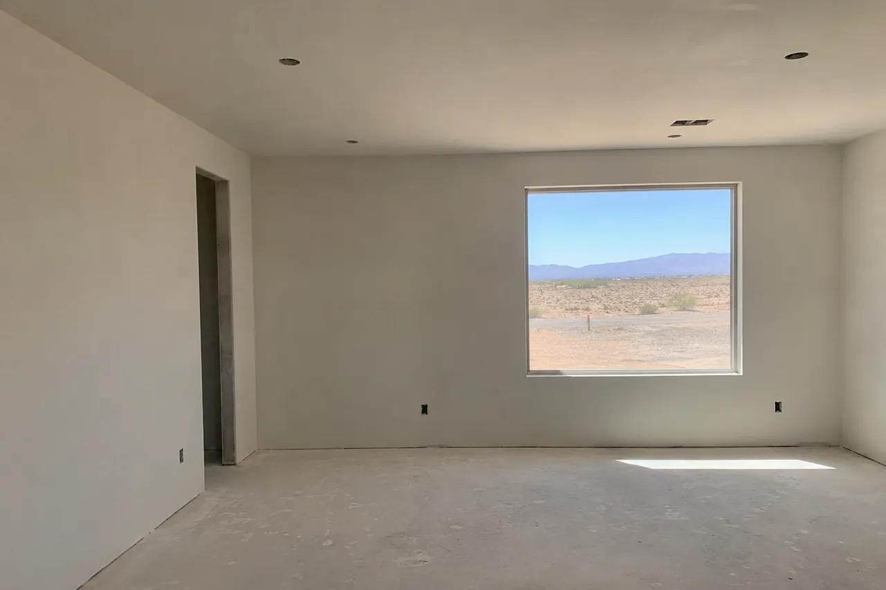 Room with drywall fully hung, taped, and sanded before painting in a Las Vegas valley home